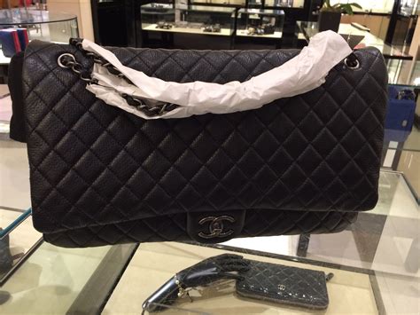 xxl chanel travel bag|chanel classic maxi flap bag.